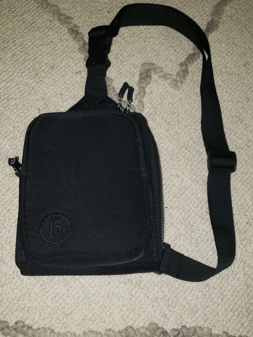 Minimalist Black Sling Belt Bag with Subtle Logo